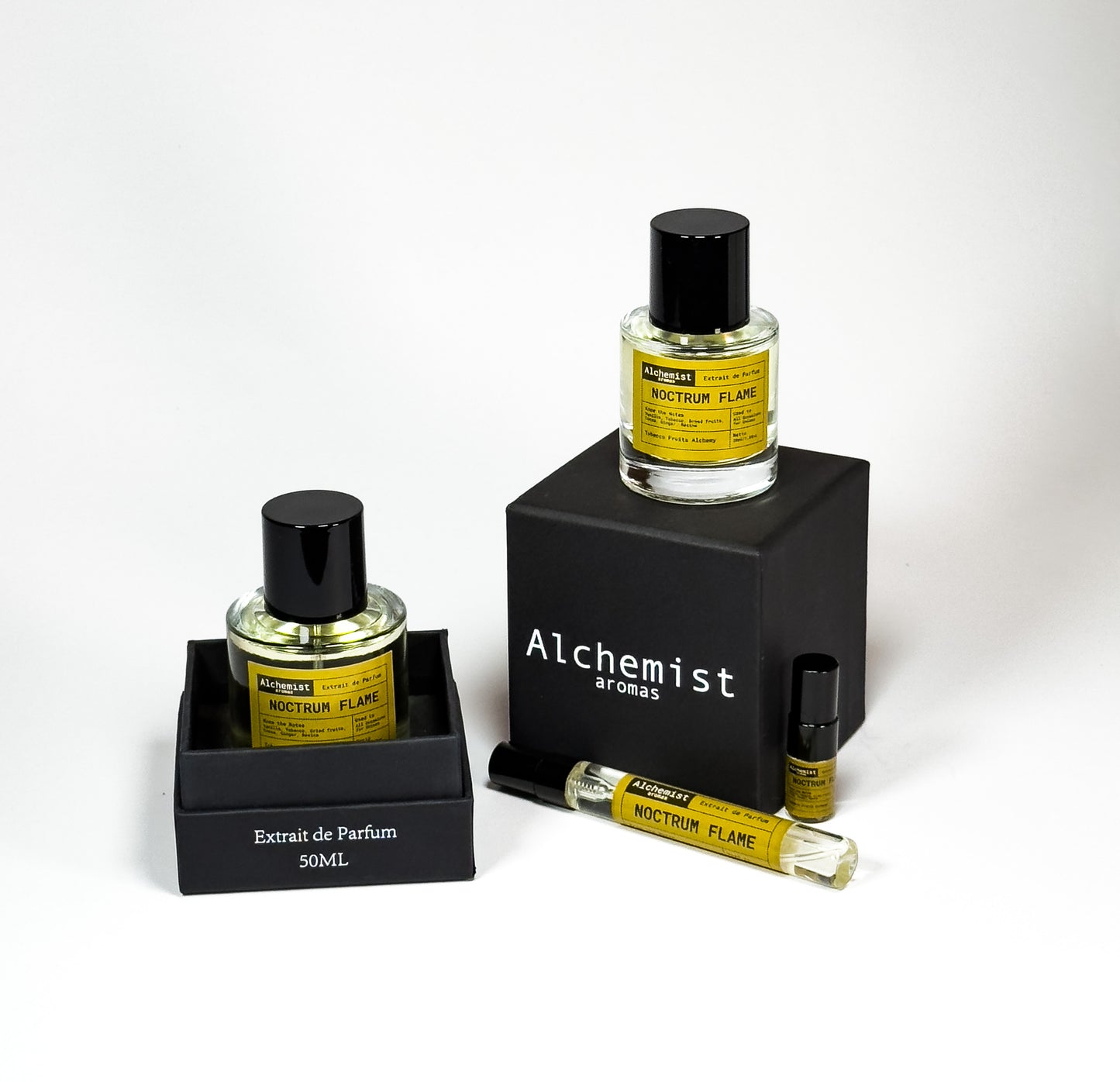 Noctrum Flame extrait de parfum bottles in various sizes on display with elegant packaging