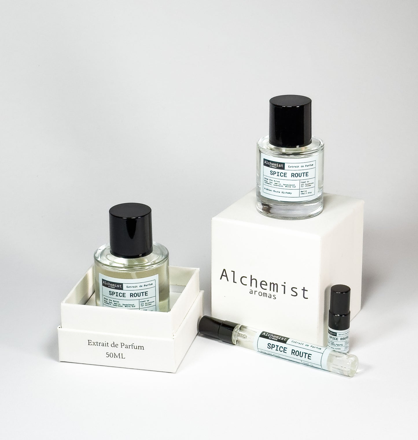 Alchemist Aromas spicy unisex perfume extrait showcased in various bottle sizes with elegant packaging