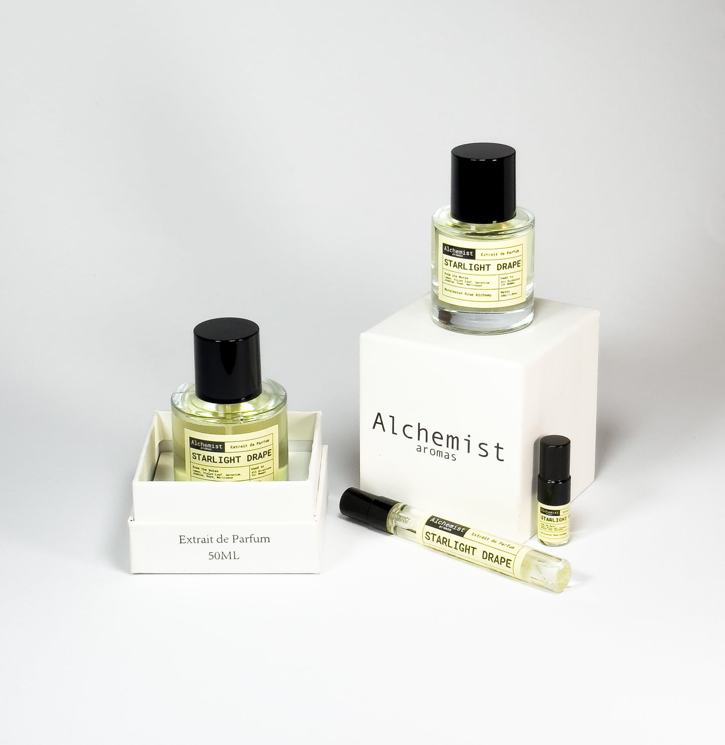 White Flower Starlight Drape Extrait de Parfum collection with various bottle sizes on display