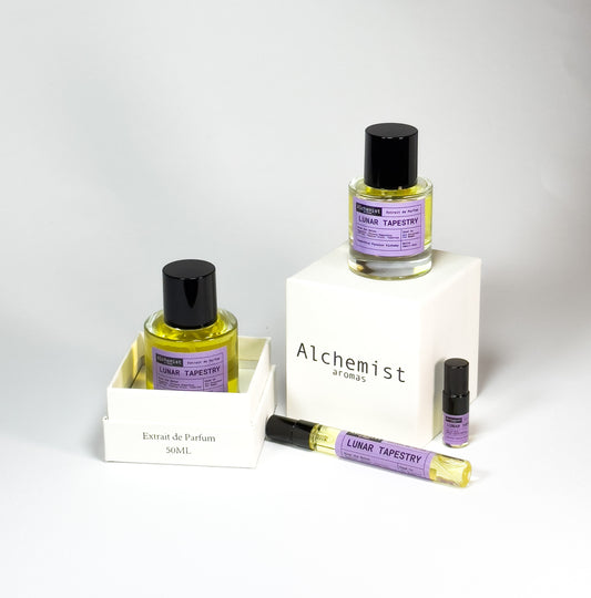 Lunar Tapestry extrait de parfum bottles in various sizes with elegant packaging and a stylish design