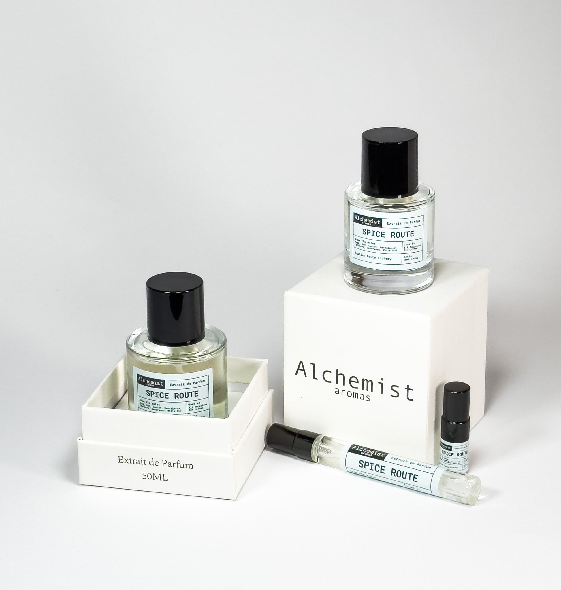 Alchemist Aromas spicy unisex perfume extrait showcased in various bottle sizes with elegant packaging