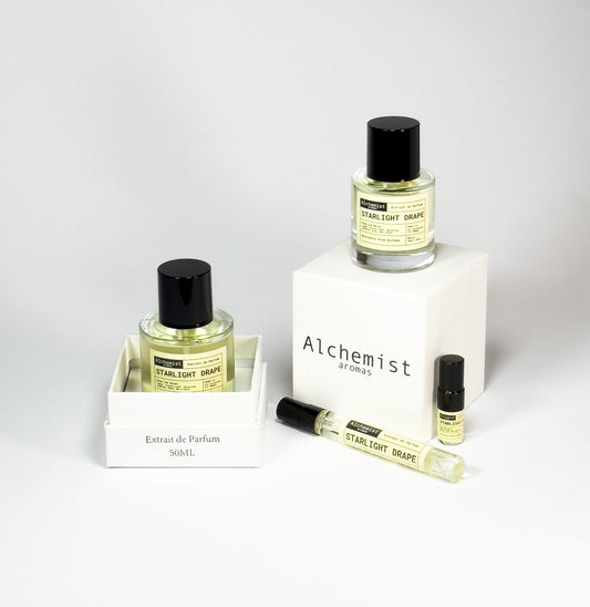 White Flower Starlight Drape Extrait de Parfum collection with various bottle sizes on display